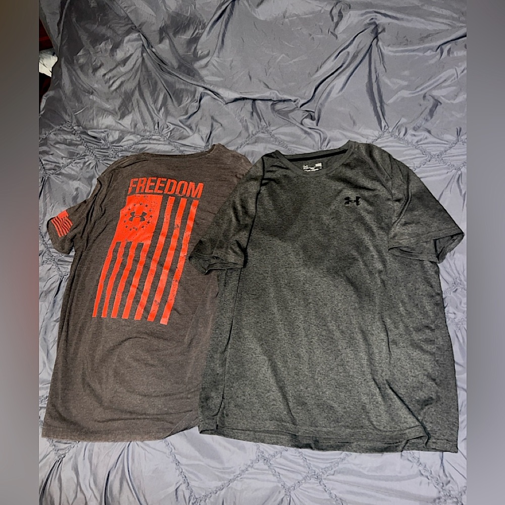 (2) Under Armour short sleeve shirts. (1) Med. (1) Large